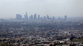 Smog covers downtown Los Angeles on Wednesday. A new report finds that the Los Angeles area had the worst levels of ozone, based on figures from 2006-2008.