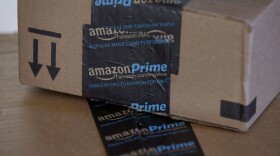This photo shows Amazon.com boxes in Phoenix, June 4, 2014