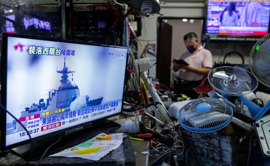A television in Taipei, Taiwan, shows a news broadcast about China's live-fire drill around Taiwan on Thursday after Speaker of the House Nancy Pelosi's visit the day before.
