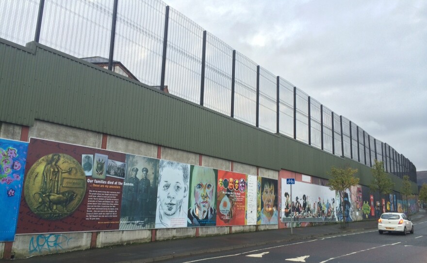 This is one of the peace walls in Belfast that separates Catholic and Protestant neighborhoods. The first barriers were built in 1969 and meant to last only six months, but they have multiplied over the years and stand to this day.