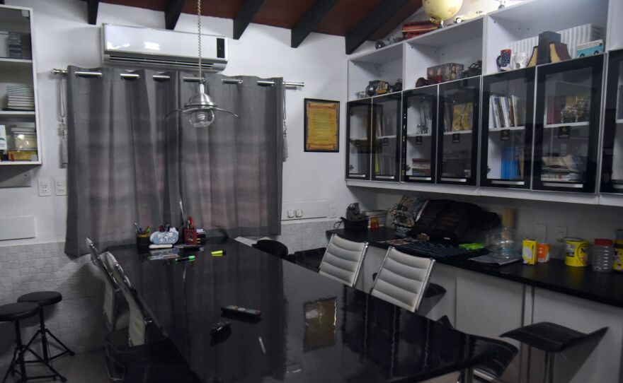 Chimenes Pavao's three-room quarters featured a plasma TV, a library and even a collection of DVDs.