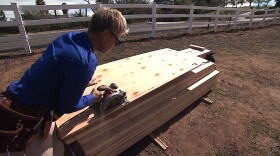 Janet Ashforth works on the construction of her tiny home, Feb. 10, 2016.