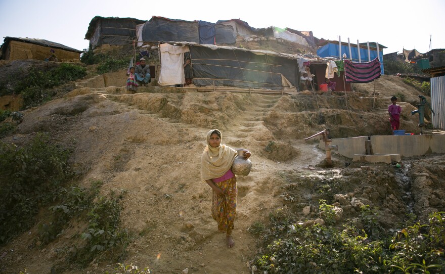 Sanura Begum says in Myanmar soldiers forced her family to pay the military roughly $7 a week for "protection." That was until the soldiers attacked them and her family fled.