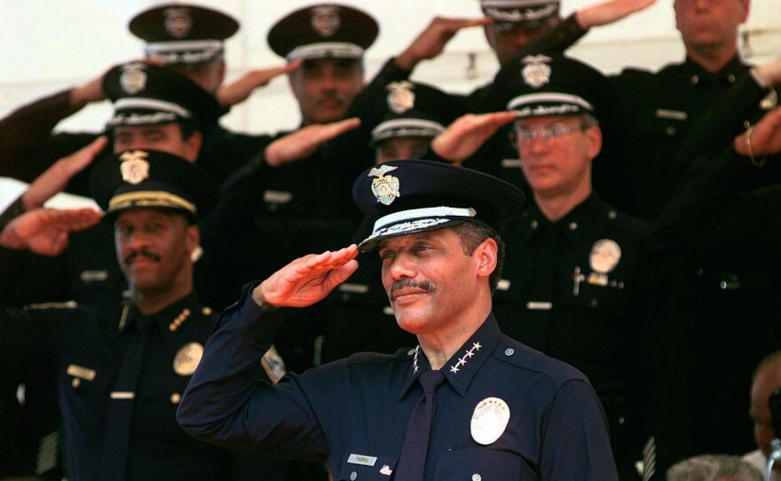New LAPD Chief Bernard Parks returns the salute of his fellow officers during the change of command ceremonies at the Los Angeles police academy on Aug. 22, 1997.