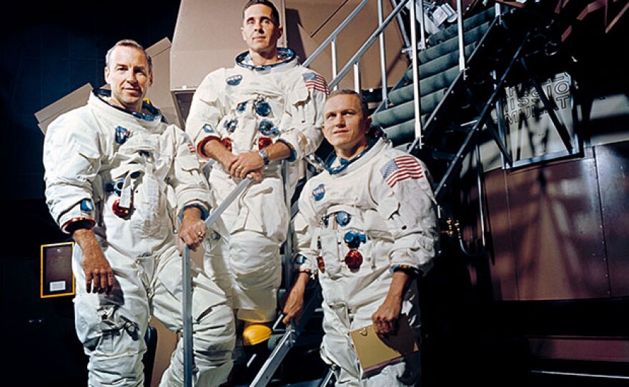 (13 Nov. 1968) Crew of the Apollo 8 lunar orbit mission. Left to right, are James A. Lovell Jr., command module pilot; William A. Anders, lunar module pilot; and Frank Borman, commander. They are standing beside the Apollo Mission Simulator at the Kennedy Space Center (KSC).