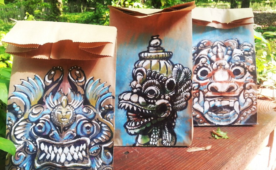 Three of Benson's lunch-bag paintings based on Balinese sculpture