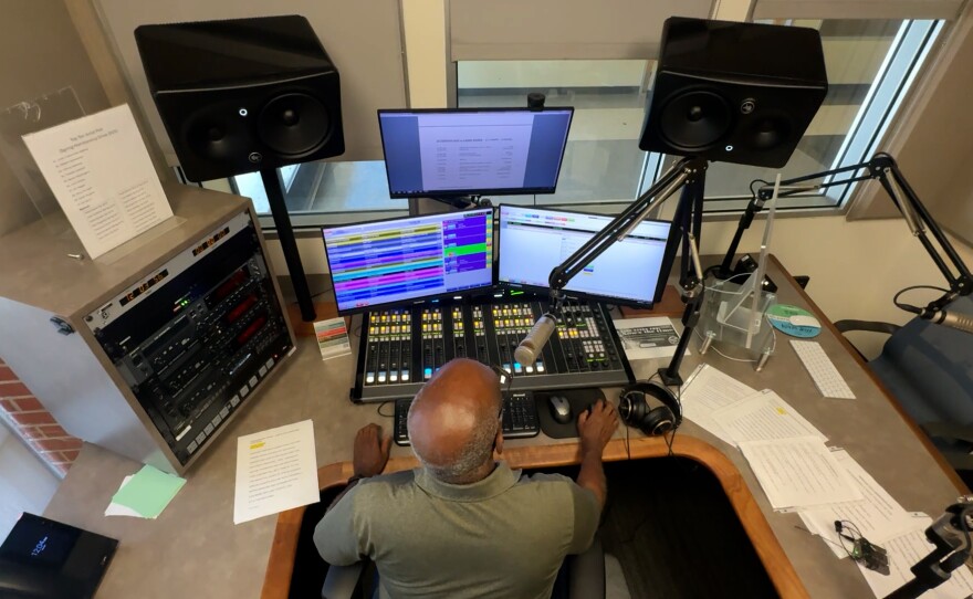 KSDS announcer Larry Murry is shown from above in the station's on-air studio on August 5, 2025.