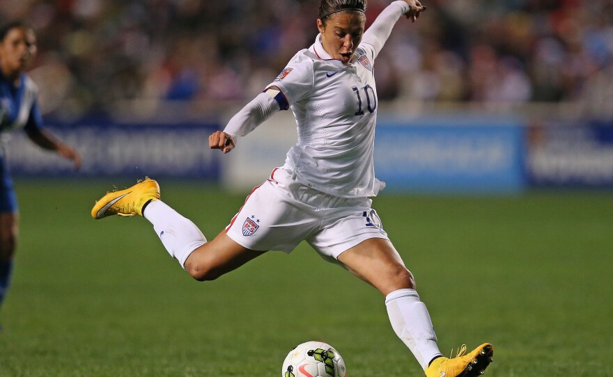 Lloyd shoots against Guatemala during the 2014 CONCACAF Women's Championship in Bridgeview, Ill.