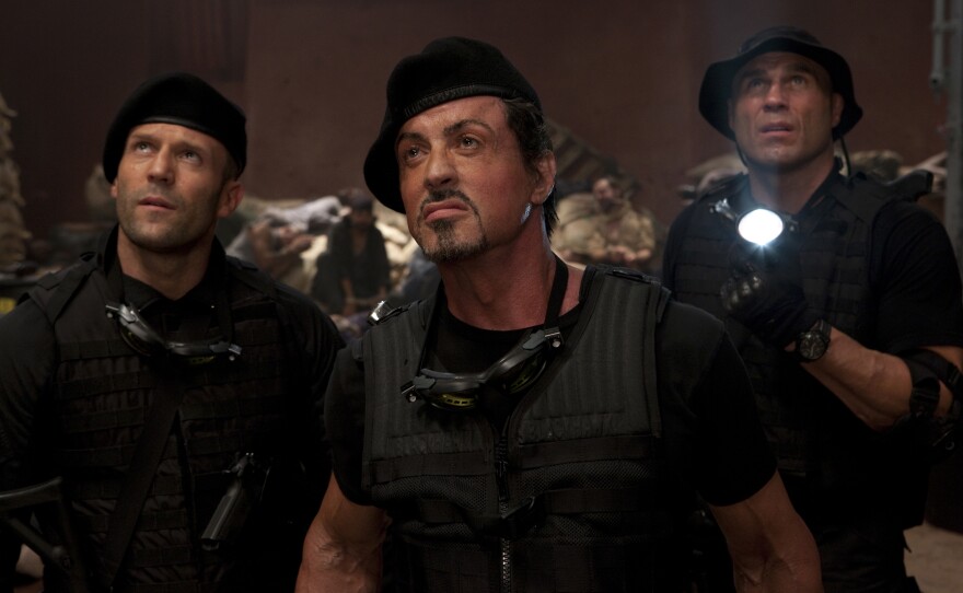 Jason Statham, Sylvester Stallone, and Randy Couture in "The Expendables"