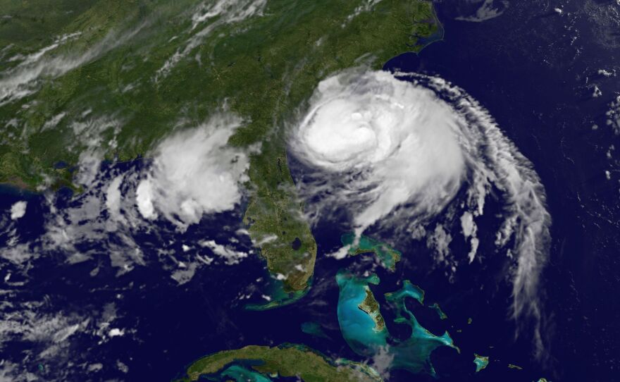 Hurricane Arthur is moving up along the eastern U.S. coast, bringing complications to July 4 travel and holiday plans. A satellite image shows the storm's position at 5 a.m. ET.