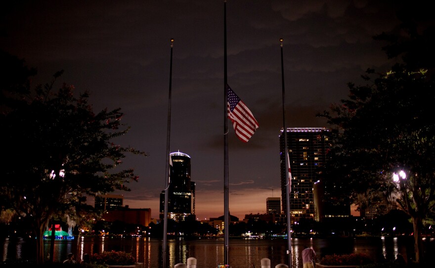 At Orlando's Lake Eola, a flag flies at half-staff on June 14 for victims of the Pulse shooting.