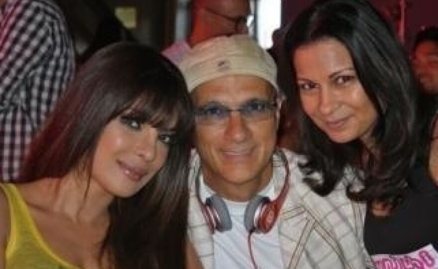 Priyanka Chopra, Jimmy Iovine, and Anjula Acharia-Bath pose together for a photo.