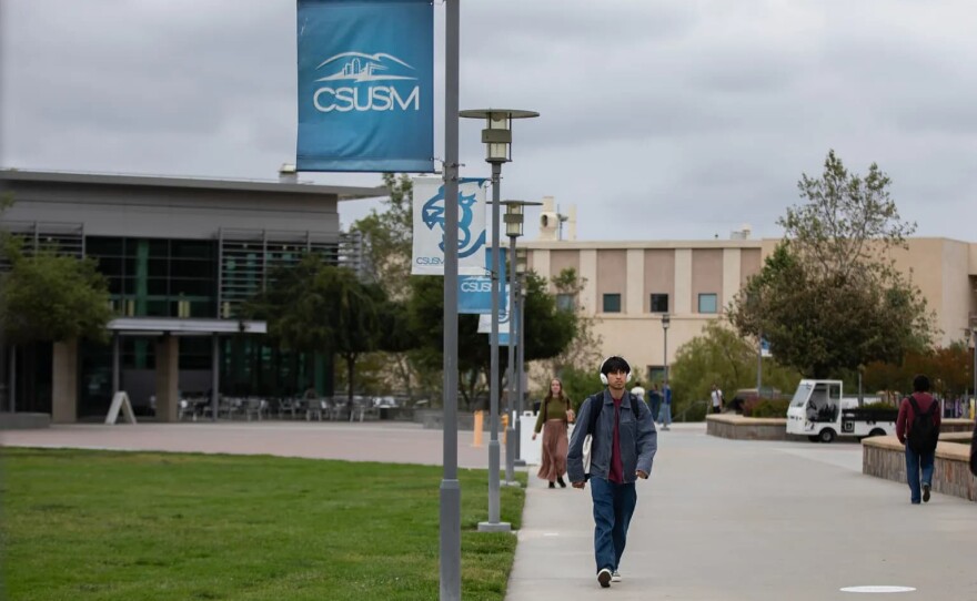 Students walk through campus at Cal State San Marcos on May 6, 2025.