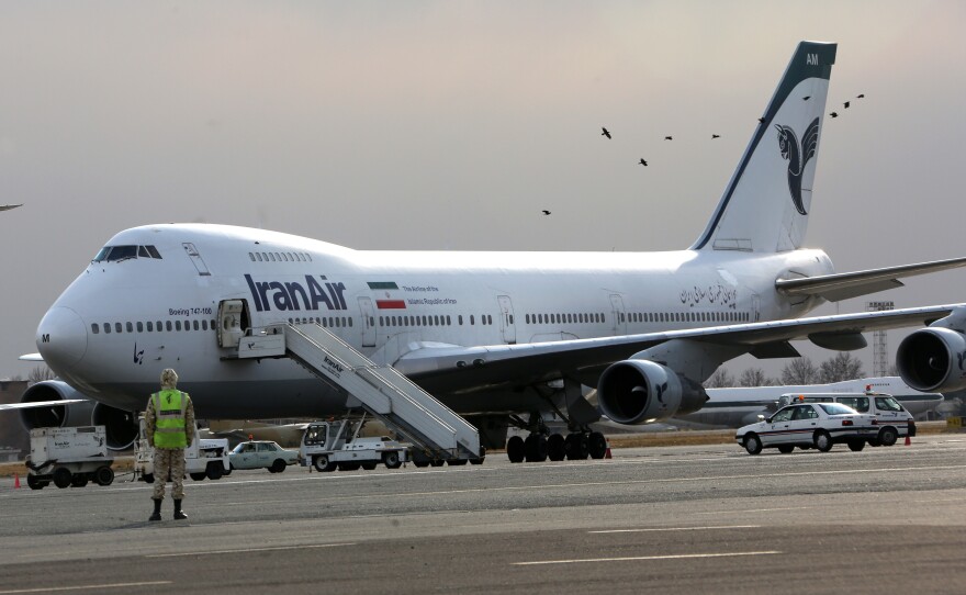 An Iran Air Boeing 747 passenger plane on the tarmac of Mehrabad Airport in Tehran in 2013. Iran bought most of its planes from Boeing before the 1979 Islamic Revolution. The country now has one of the oldest airline fleets in the world. With sanctions lifted, Boeing can once again sell planes to Iran, but the country recently announced a major deal with Airbus.