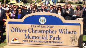 A monument dedicated to slain San Diego police Officer Christopher Wilson was unveiled Oct. 27, 2014. The monument says "City of San Diego, Officer Christopher Wilson Memorial Park, Park and Recreation Department, Donated by Councilmember Myrtle Cole."