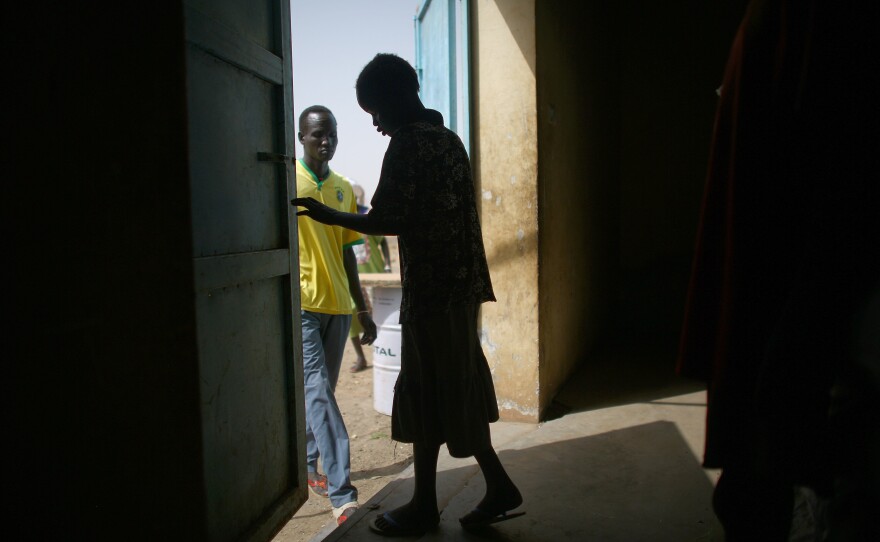 A woman has just picked up her medication at a Doctors Without Borders clinic in Bentiu.
