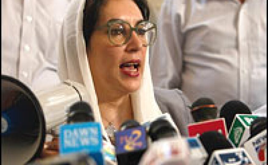 Former Prime Minister Benazir Bhutto addresses members of the media Oct. 19, 2007, at a news conference in Karachi, Pakistan.