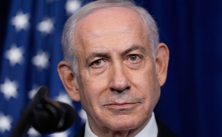 Israel's Prime Minister Benjamin Netanyahu listens during a news conference with President Donald Trump at Mar-a-Lago, Monday, Dec. 29, 2025, in Palm Beach, Fla.