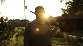 U.S. Army veteran Alex Sutton after shooting a rifle on his farm in rural Moore County, N.C., Oct. 2, 2014.