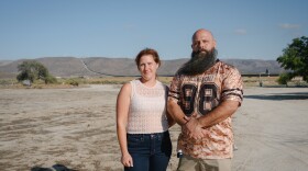 Jess Price, left, and Danny Leon Sr. stand for a portrait in front of the dirt lot where they hope to build a youth soccer field in Jacumba Hot Springs, California, in East County on Sept. 26, 2025.
