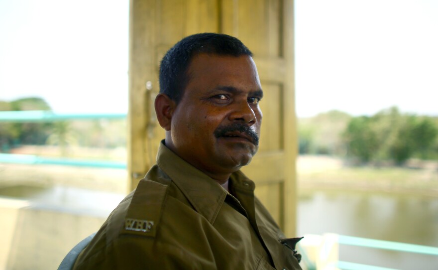 Debnath Mondal was attacked by a tiger in 2010. "I saw the tiger coming in. Everyone shouted, 'Tiger!' But before I could do anything, it pounced on me. It landed on my thighs and chest and bit my face and head," he says. Though seriously injured, he continues to work as a guard in the national park in the Sundarbans.