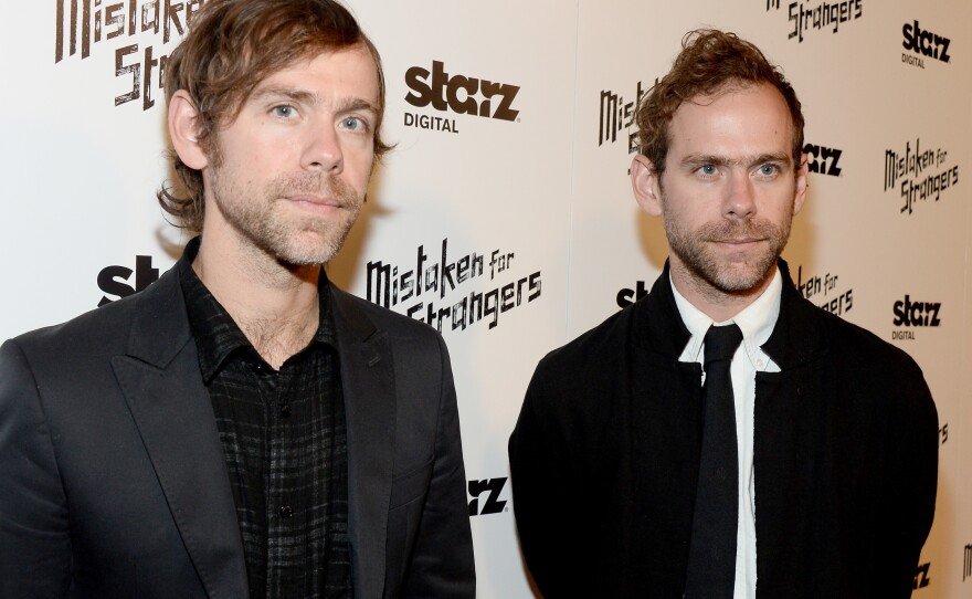 Aaron Dessner (L) and Bryce Dessner attend the Los Angeles screening of <em>Mistaken For Strangers</em>, a documentary about The National, in 2014.