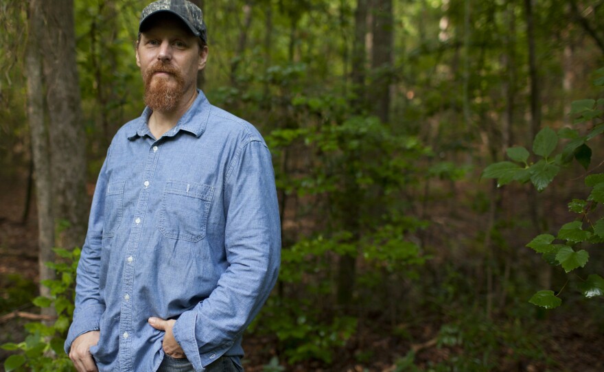 David Daniel stands on his property in Winnsboro, Texas, where the Keystone XL pipeline is slated to be installed. Daniel is opposed to the pipeline, which will carry oil from Canada's tar sands.