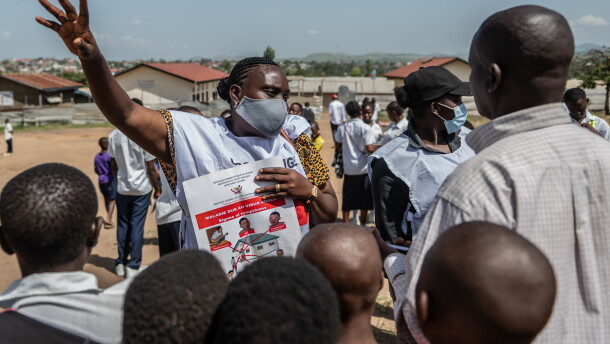 Vanny Birungi, a Red Cross volunteer, speaks to people during a public sensitisation campaign amid the Ebola outbreak in Bunia, Congo, Monday, May 25, 2026.
