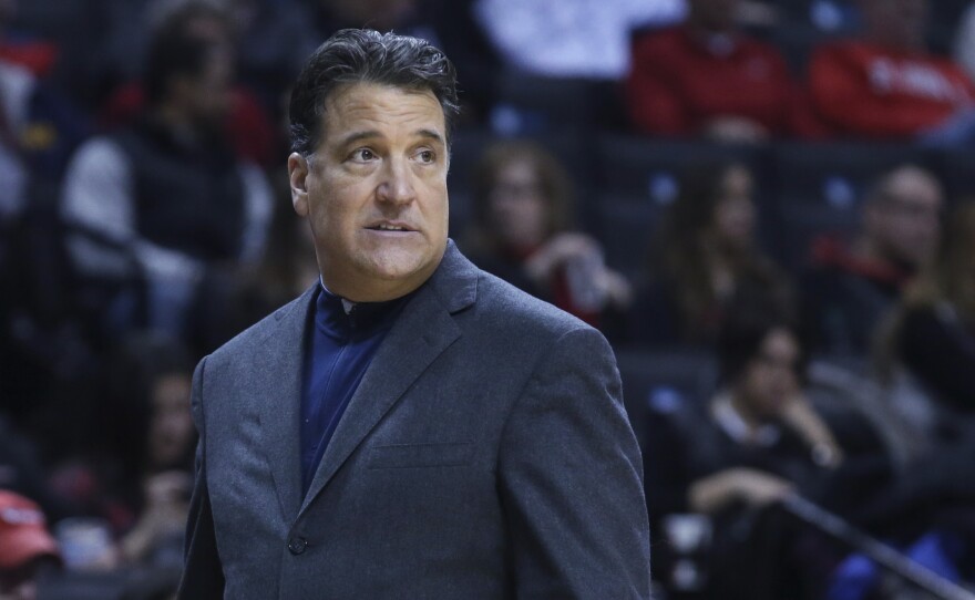 File photo of coach Steve Lavin walking along the sideline during the first half of St. John's NCAA college basketball game against Tulane on Dec. 28, 2014, in New York.