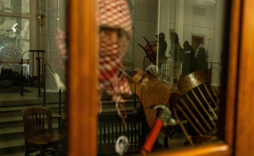 Demonstrators supporting Palestinians in Gaza barricade themselves inside Hamilton Hall on the Columbia University campus on April 30, 56 years after protesters occupied the same building in 1968.