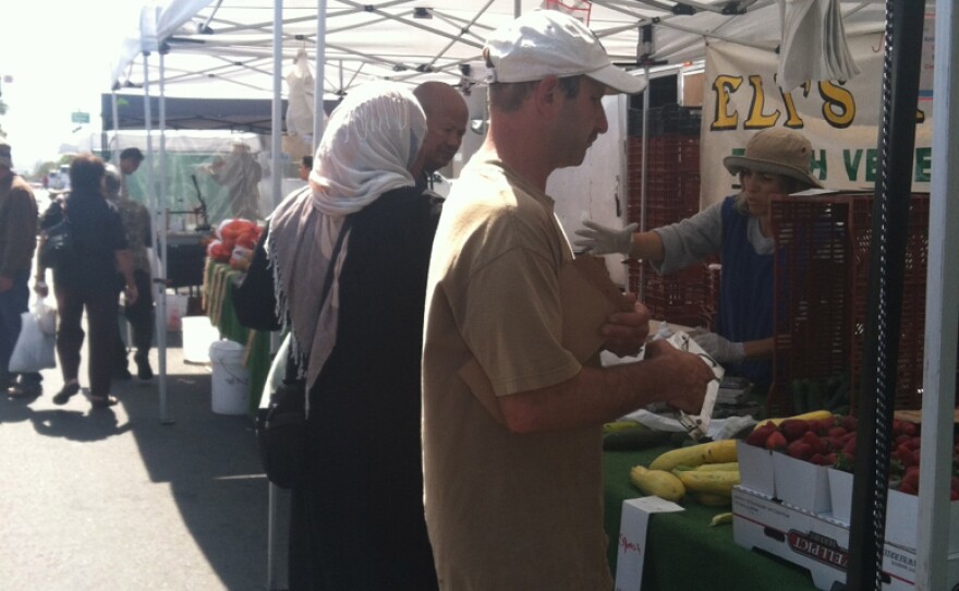 Farmer Eli Hofshi is a longtime vendor at the City Heights Farmers Market.