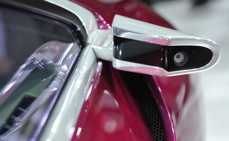 A camera is used instead of a rearview mirror on the Toyota NS4 plug-in hybrid concept car at the North American International Auto Show in Detroit on Jan. 10. 