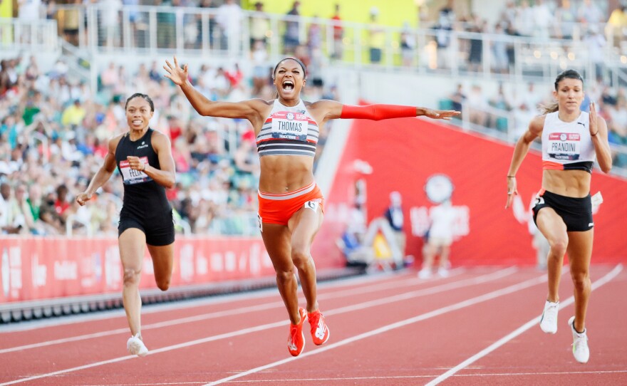 Gabby Thomas crosses the finish line ahead of Allyson Felix and Jenna Prandini in the Women's 200 Meters Final at the U.S. Olympic Track & Field Team Trials at Hayward Field on June 26, 2021 in Eugene, Ore.