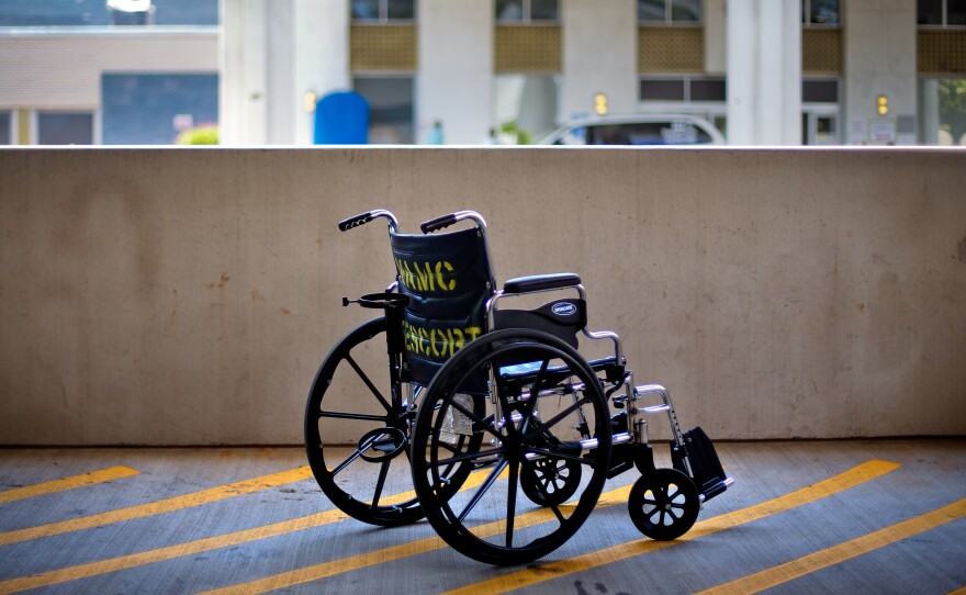 A wheelchair sits outside the Atlanta VA Medical Center in Atlanta. The latest figures show there are about 900,000 claims for benefits pending at the Department of Veterans Affairs.