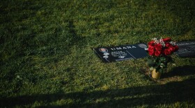 The setting sun illuminates Brian Umana's gravestone at a cemetary in San Diego, California is seen on April 23, 2025. After a three year-legal battle, Brian's family and their attorneys won a $1 million settlement from National City for his 2021 killing by police.