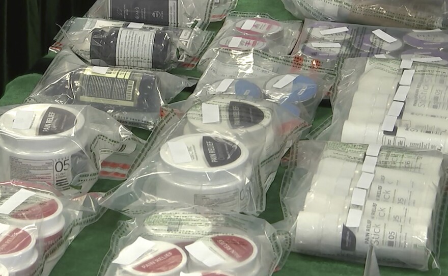 In this image made from a video, products containing CBD are displayed at a press conference by Hong Kong Customs in Hong Kong, Friday, Jan. 27, 2023.