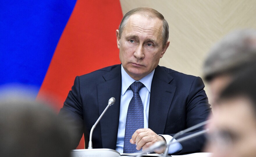 Russian President Vladimir Putin leads a Cabinet meeting at the Novo-Ogaryovo residence outside Moscow on Wednesday.