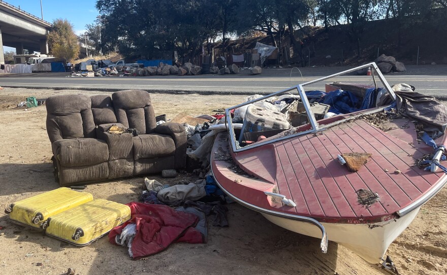 Homeless encampments crowd the freeway underpasses and dirt shoulders along Roseville Road, northeast of downtown Sacramento, along with piles of trash and discarded goods. Stranded boats have become another form of shelter for California’s homeless.