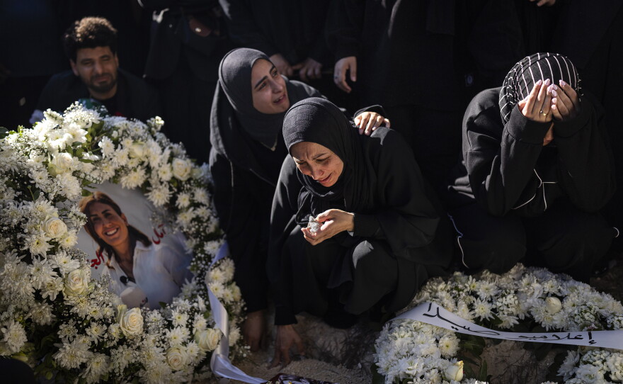 Mourners attend a funeral in Baisariyah, Lebanon, on April 23, 2026, for Amal Khalil, a journalist who was killed in an Israeli attack.