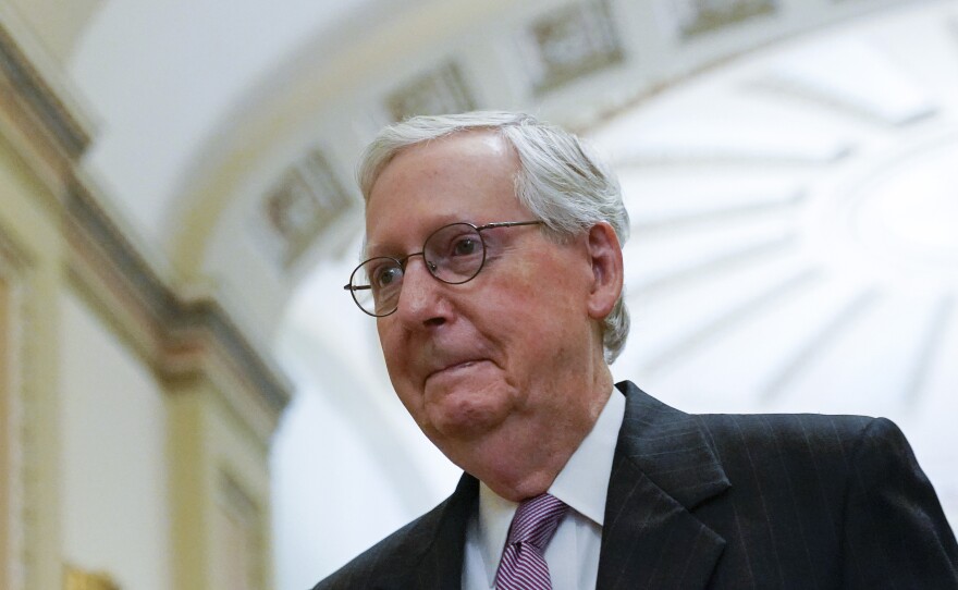 Senate Minority Leader Mitch McConnell of Ky., arrives on Capitol Hill in Washington, Thursday, Sept. 30, 2021.