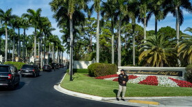 FILE - The motorcade for President Donald Trump arrives at Trump International Golf Club, Jan. 2, 2026, in West Palm Beach, Fla.