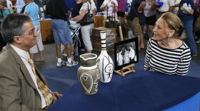 Stuart Slavid (left) appraises Picasso Madoura pottery, ca. 1954, in Tucson, Ariz. ANTIQUES ROADSHOW “Vintage Tucson 2021 Hour 1” premieres Monday, January 25 on PBS.