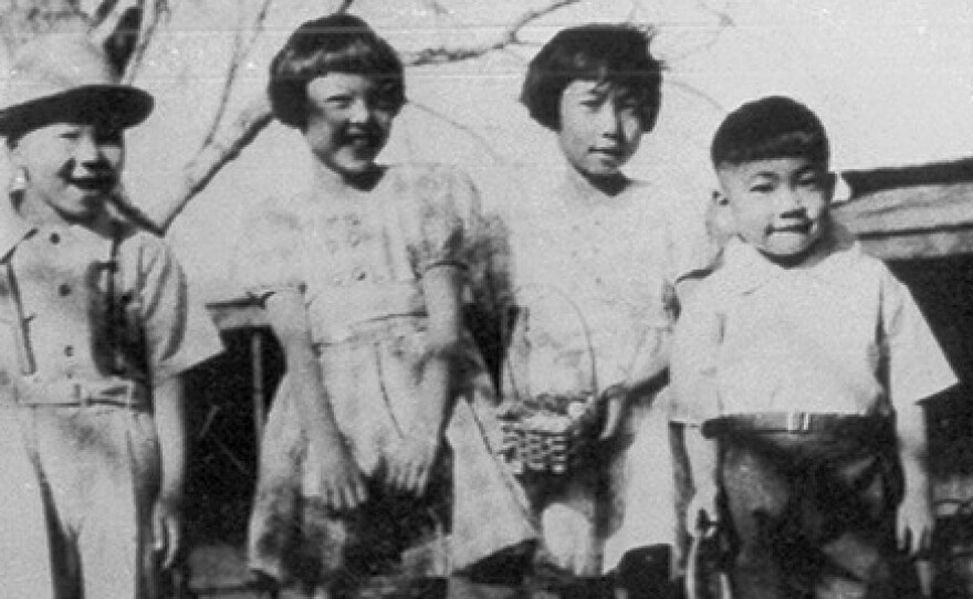 Roy Ebihara (far left) with his siblings, Mary, Kathy and Bill on Easter 1941 in Clovis, N.M. In 2014, Roy and his family received a formal public apology from the mayor of Clovis for the mistreatment they endured there.