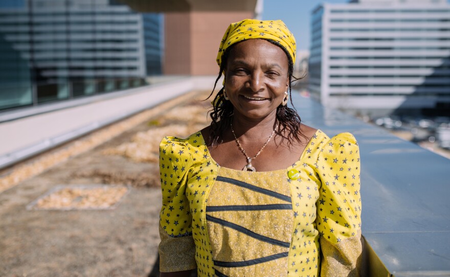 Monica Maigari, a Female Food Heroes contestant from Nigeria, is visiting Washington, D.C., for the first time on a trip sponsored by Oxfam. She says NPR's rooftop garden, where she is pictured, is "great for carrots and tomatoes."