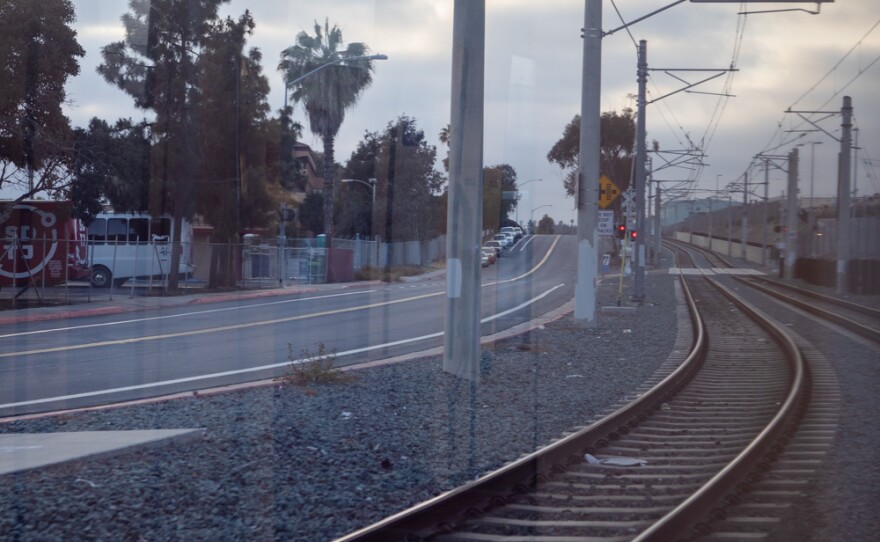 The tracks of the Blue Line are seen from inside a trolley heading towards downtown San Diego, June 1, 2021.