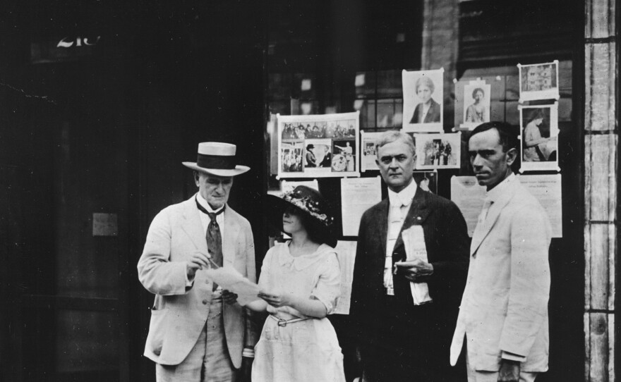 Anita Pollitzer, legislative secretary of the National Woman's Party, meets with Tennessee Sen. John C. Houk (left), Knoxville Mayor E.W. Neal and state Rep. R.I. Johnson — who were suffrage supporters — in front of the Nashville headquarters in August 1920.