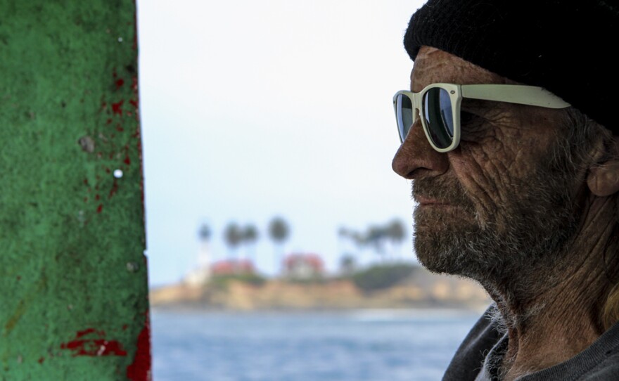 Commercial fisherman Kenny Jeavons pilots the Erin B. out of San Diego Bay with urchin diver Pete Halmay in July 2016. Photo by Brad Racino, inewsource.