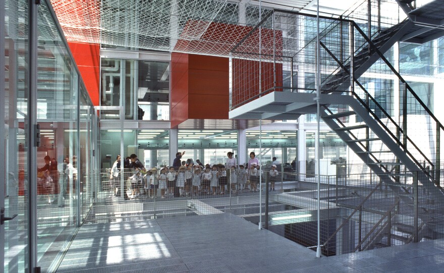 A central atrium in the Hiroshima Nishi Fire Station spotlights the work and training of the firefighters. A lobby and terrace are open for public use.