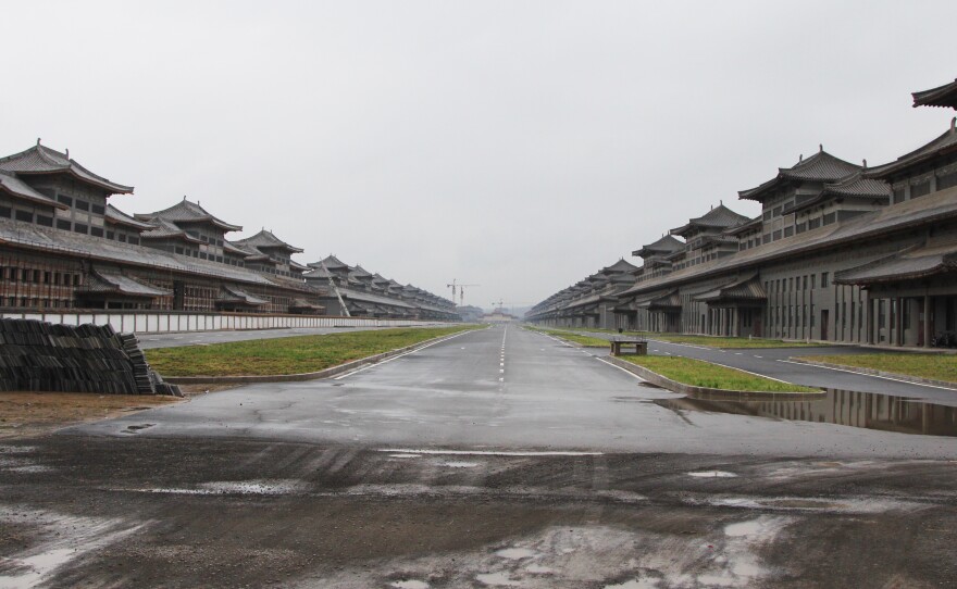 A state-owned company started building "Liquor City" in a suburb of Luliang to help diversify the economy away from coal. But a massive anti-corruption campaign has damaged demand for expensive Chinese baijiu or white liquor and for now, the factory complex remains unfinished.