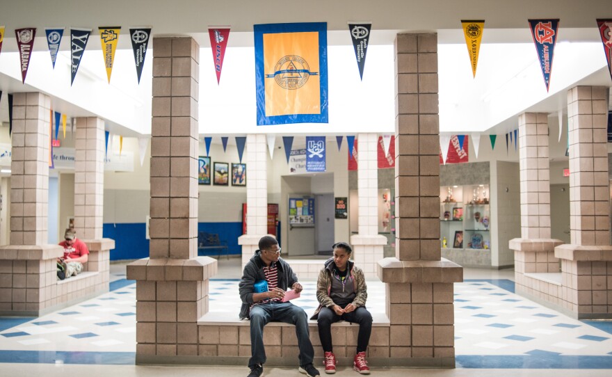 Gordon listens to schoolmate Essence Greene. He is quick to respond to the needs of fellow classmates.